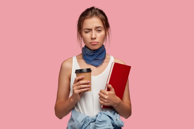 Youth,,Studying,And,Tiredness,Concept.,Displeased,Sleepy,Overworked,Girl,Closes